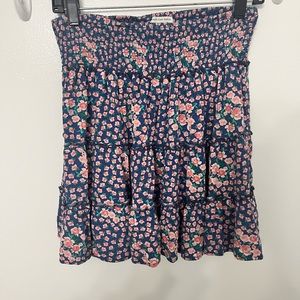 Boho inspired American Eagle skirt with a flowery pink and purple print.